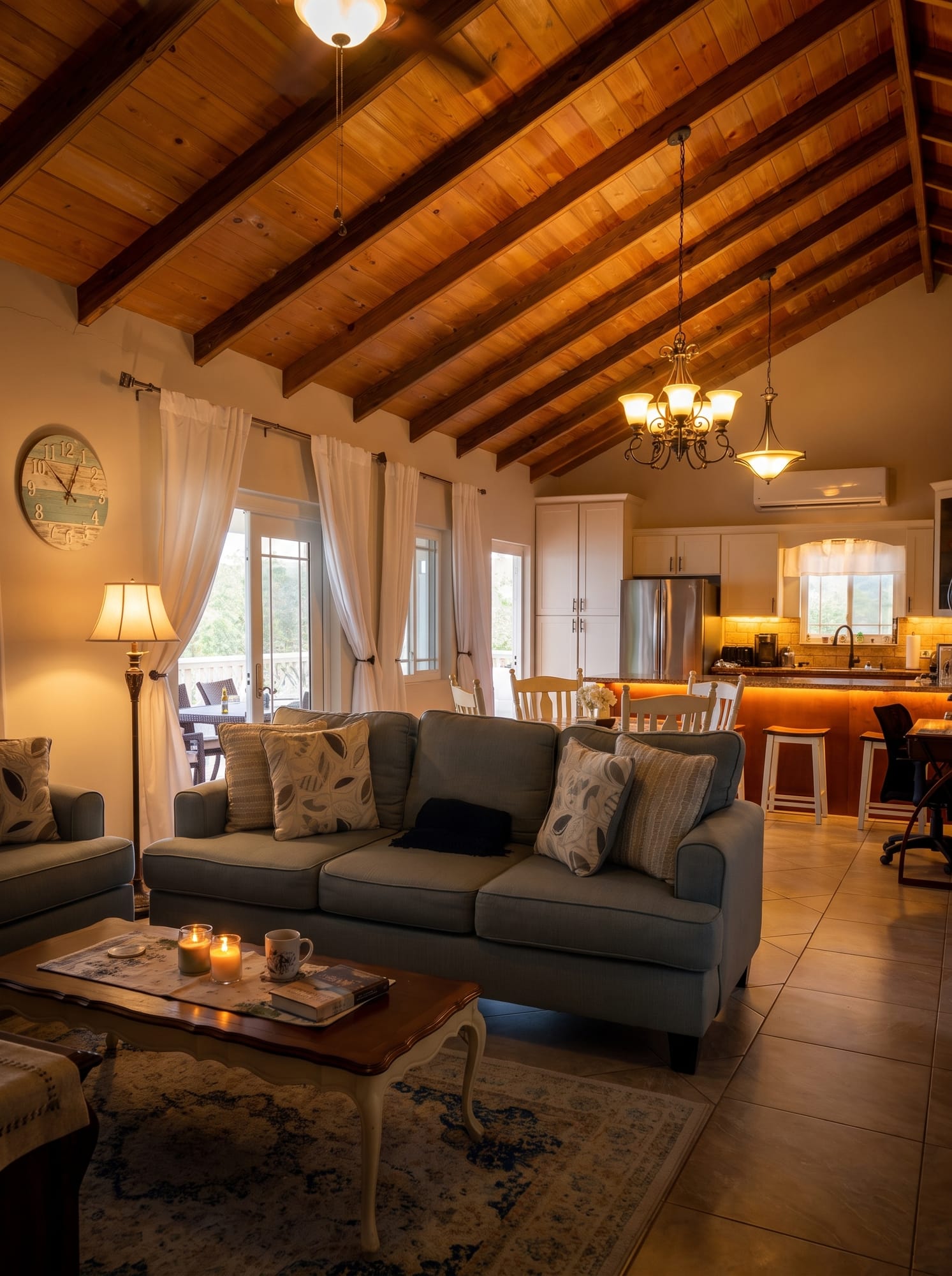 Living room of an apartment under a timber cathedral ceiling