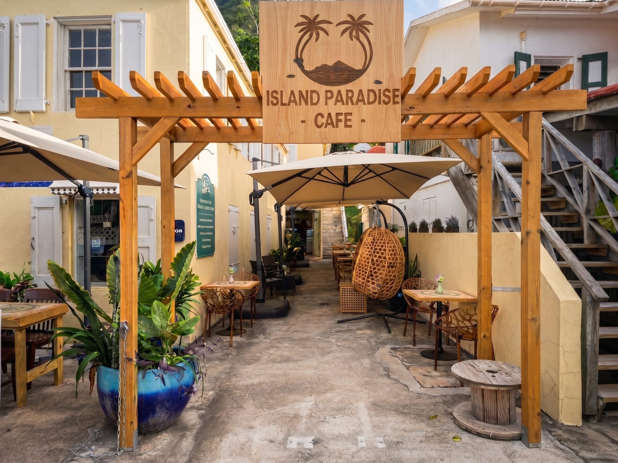 The pergola entrance of the Island Paradise Cafe courtyard